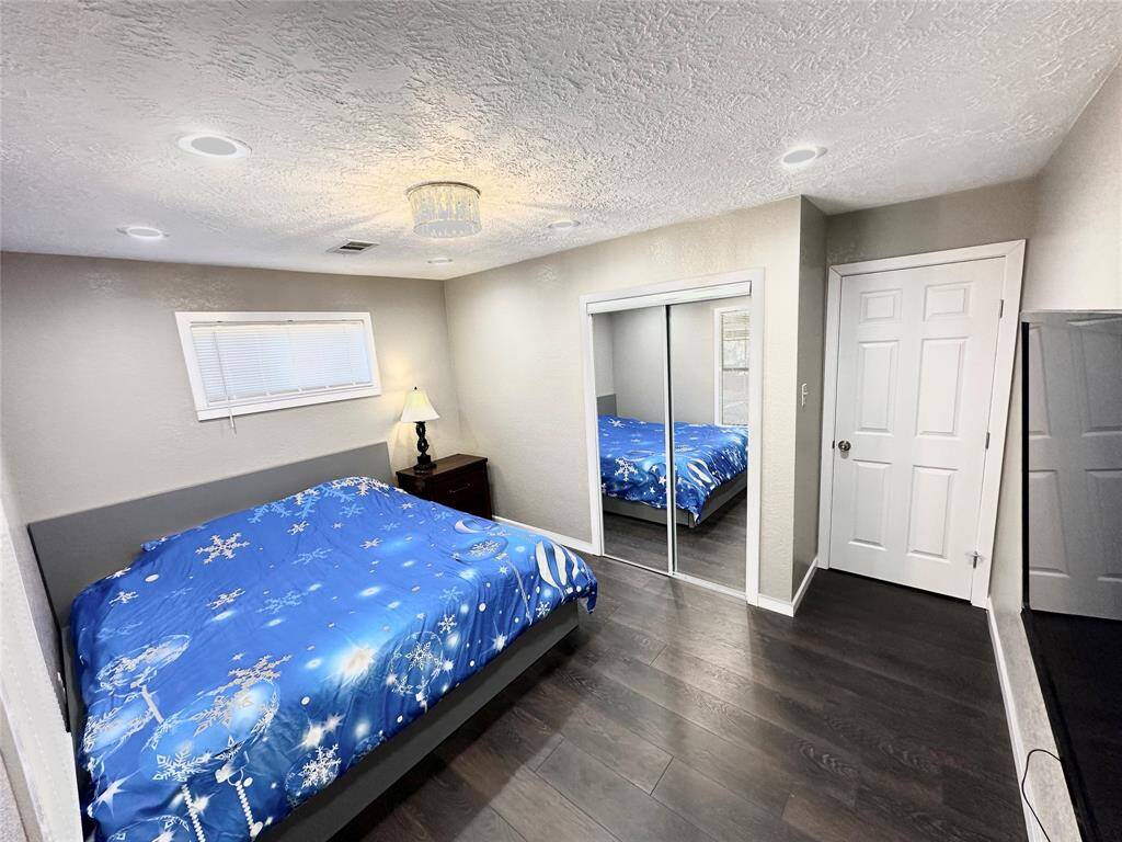 Office room that’s used as third bedroom with private door