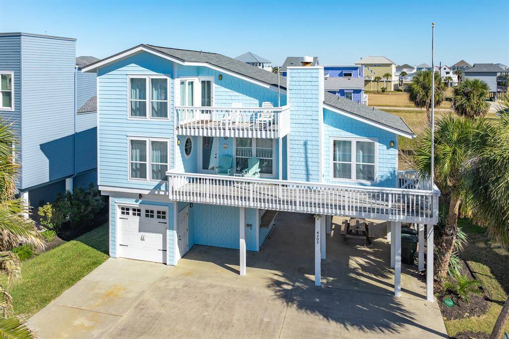 Affordable beach house just a short walk/golf cart ride to the beach! Great deck spaces on the main level and a private deck on the second level just outside the primary suite.