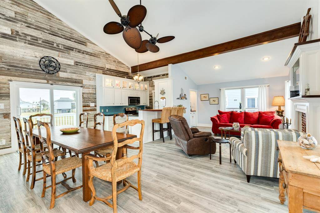 The main area of the home has a wonderful open layout, high ceilings with nautical & coastal design accents.