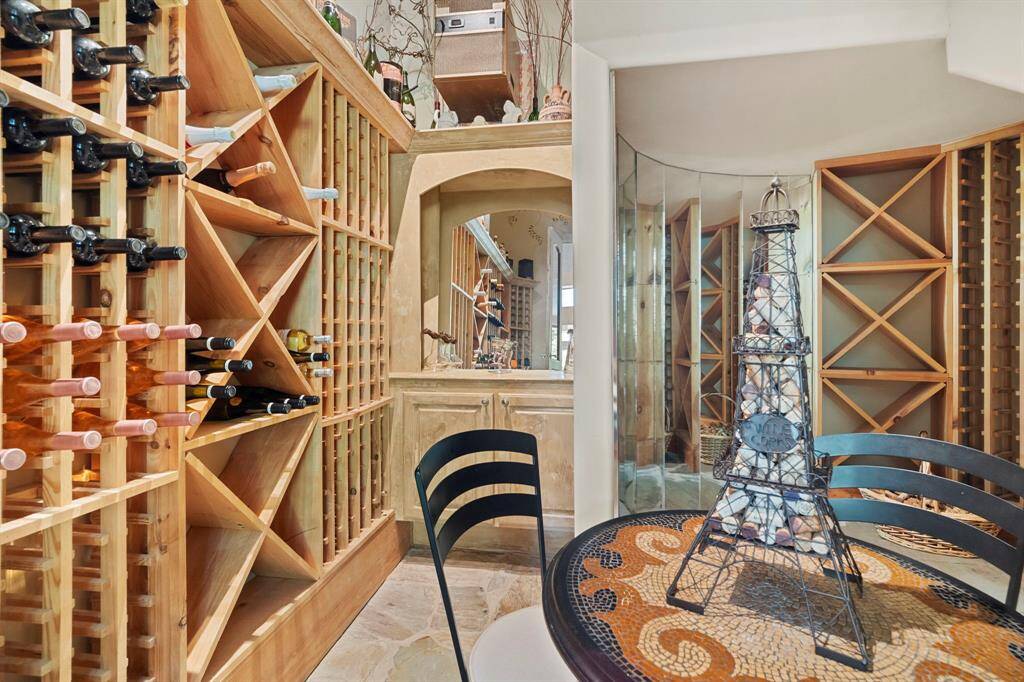 Climate-controlled wine room can accommodate over 500 bottles of wine.
