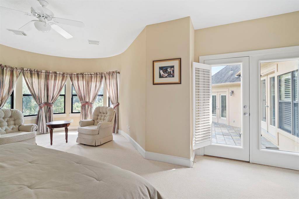 Doors to the balcony have plantation shutters to provide shade and privacy.