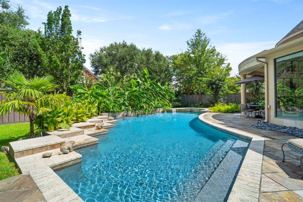 Mature plantings provide privacy.