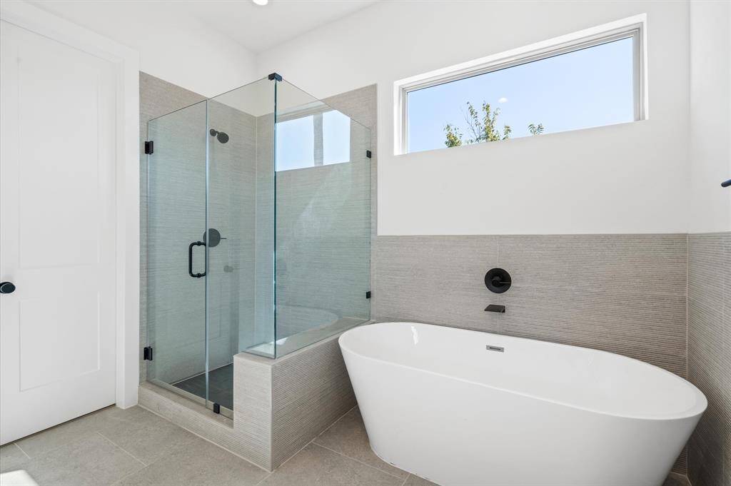Soaking tub and separate shower  Previous similar construction.