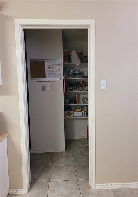 Laundry room on your left and pantry on the right