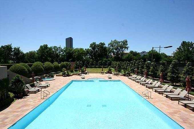 Relaxing pool area with lush surroundings