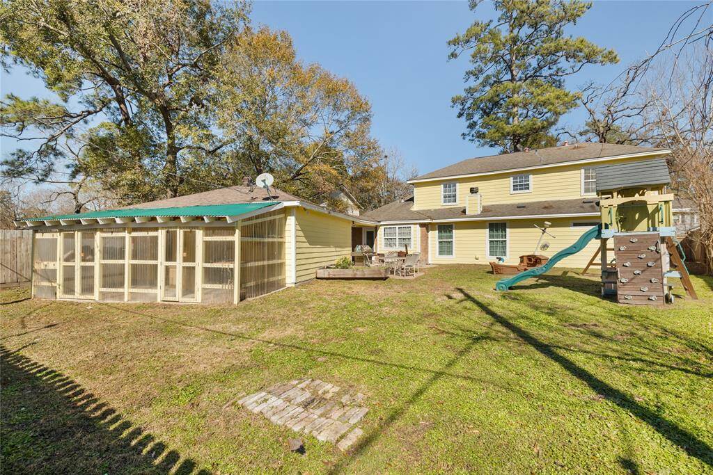 Attached to the back of the garage you'll find an enclosed storage area, which could be used as a greenhouse