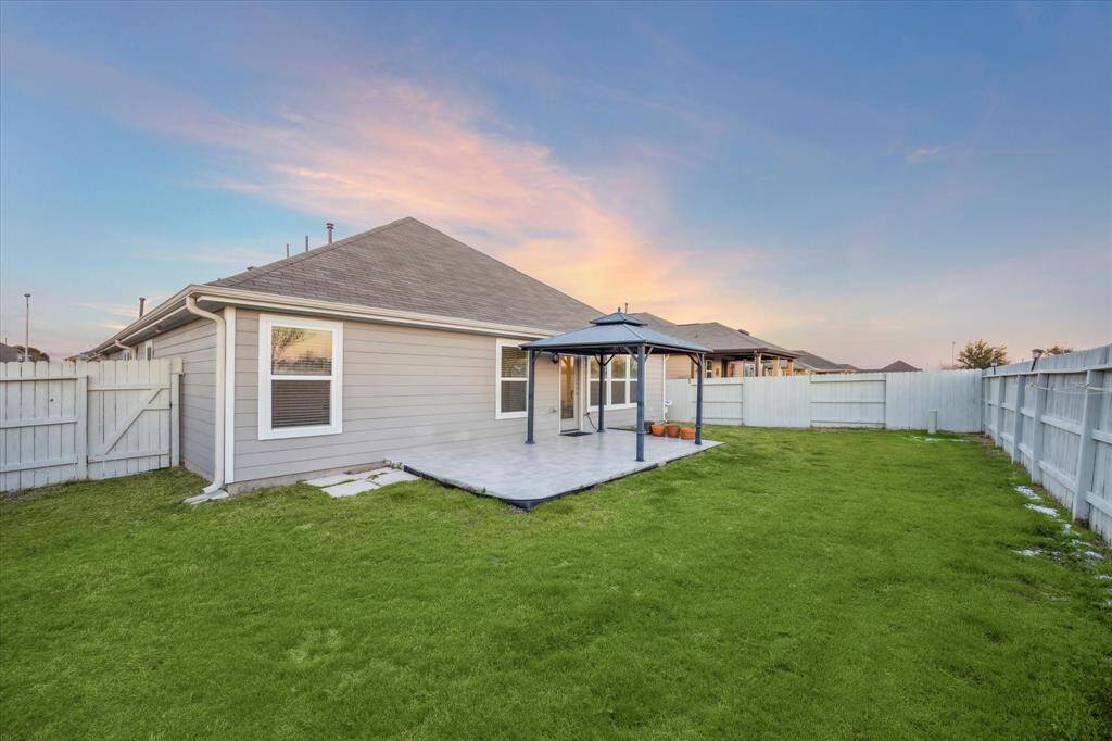 THE BACK YARD HAS GREAT POTENTIAL AND IS WAITING FOR ALL YOUR LANDSCAPING IDEAS!