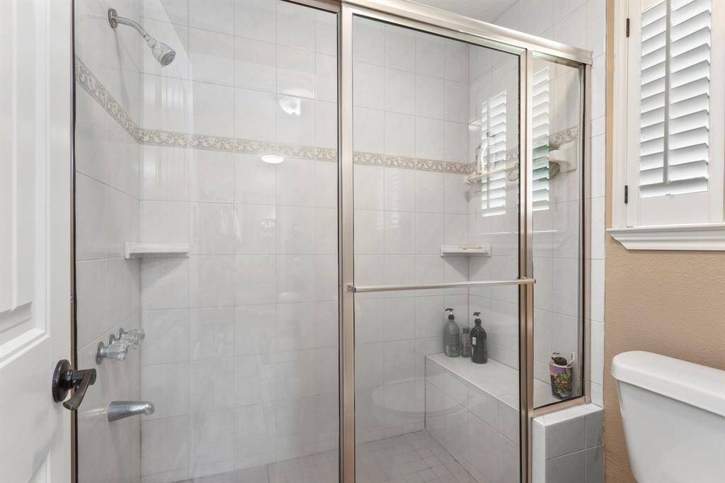 Master bath shower and water closet.
