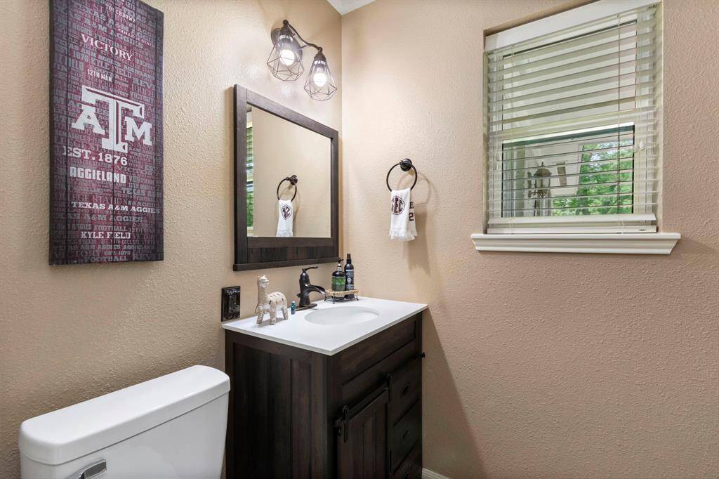 Half bath in front secondary bedroom.