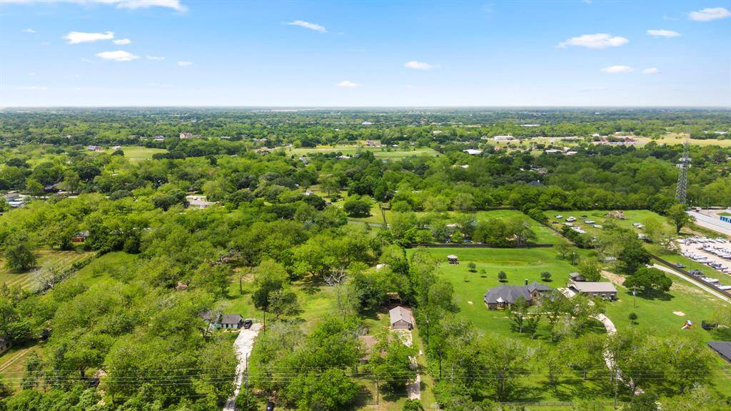 Additional aerial view of the property and those surrounding it.