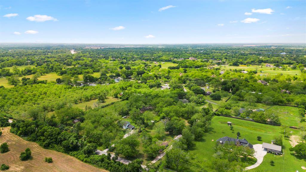 One more overall aerial view. This is a wonderful "away from it all" property. Unrestricted acreage.
