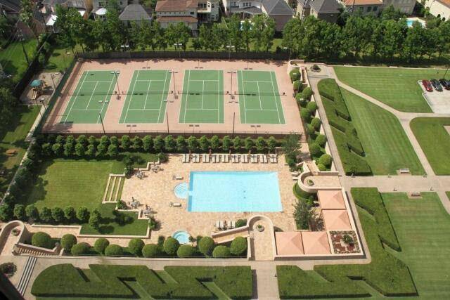 Resort style living with Olympic pool and tennis courts