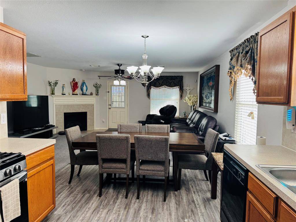 Kitchen flows to breakfast area and living room