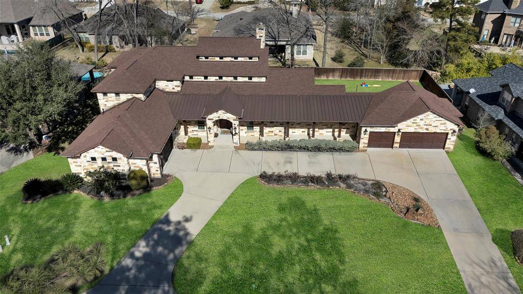 Aerial view of the home shows the majestic roof line and how impressive this home is.