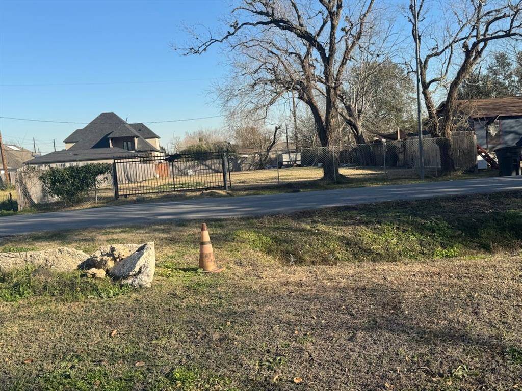 The property is the one completely fenced with iron Gate