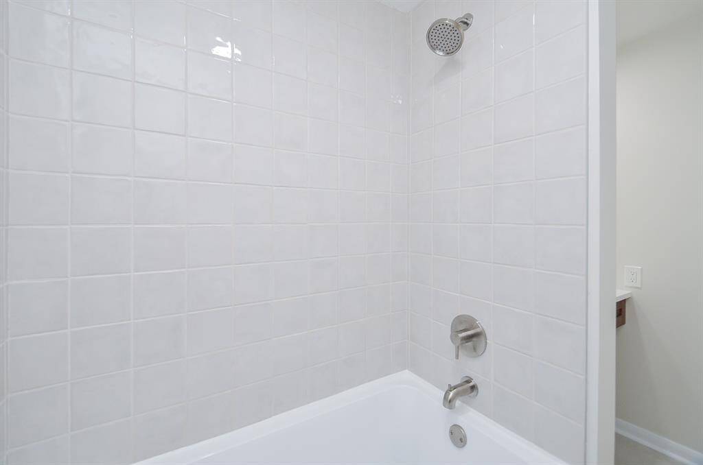 Secondary bathroom with spacious bathtub