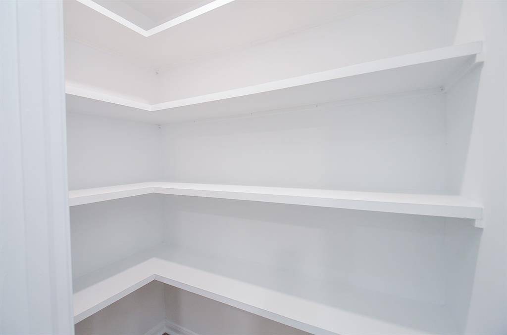 Walk in pantry with plenty of shelving space
