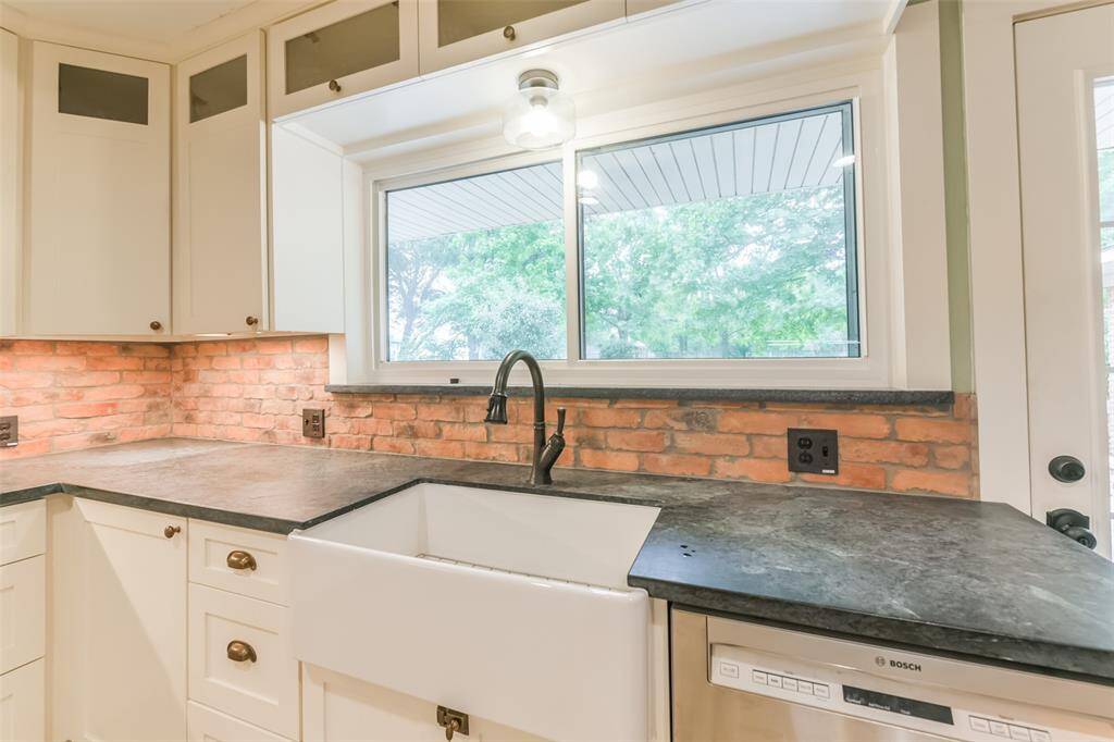 kitchen with soapstone countertops and porcelin farmhouse sink