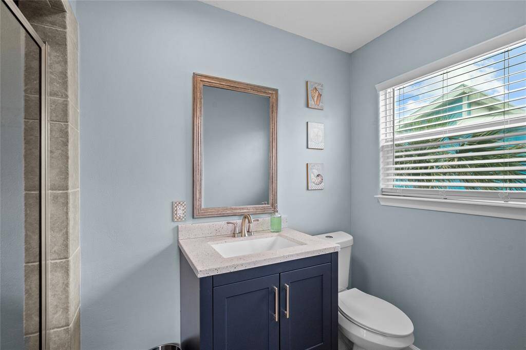 En-suite Primary bathroom with a beautiful tile shower.