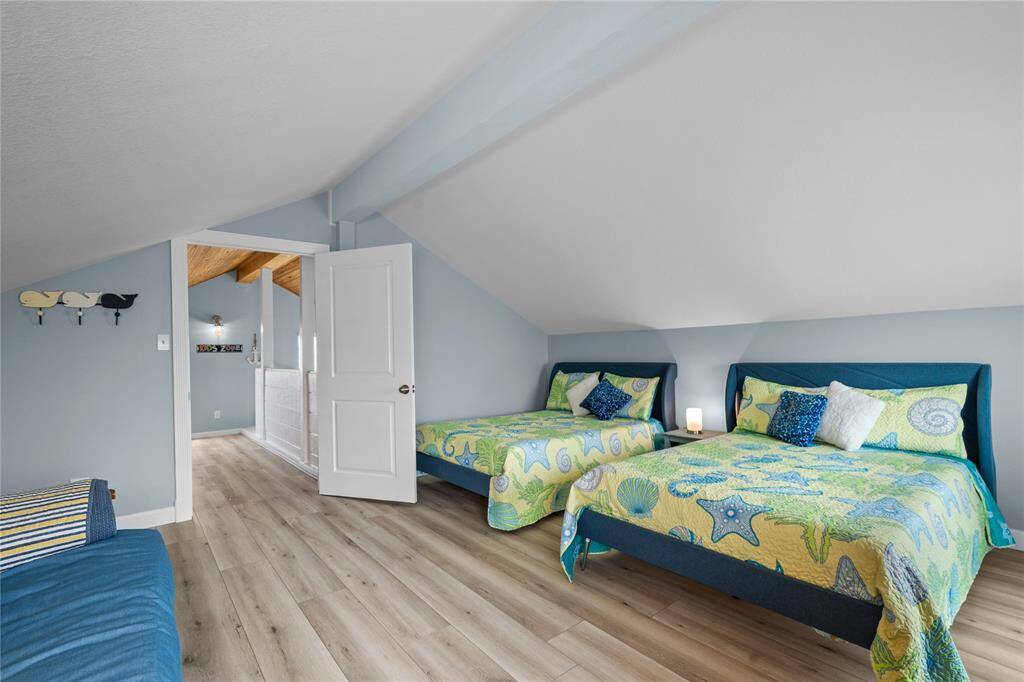 2 Queen beds, and a Futon. This area is great for kids of all ages.