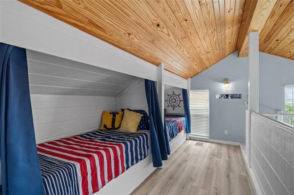 This could be YOUR Kids Zone. Kids LOVE Captain Beds. Curtains to add privacy.