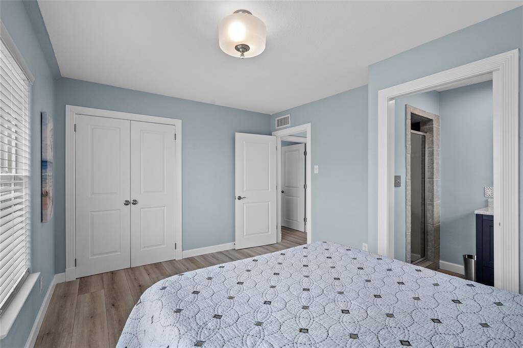 Primary bedroom, with en-suite bathroom. Large closet with a Wardrobe included (not pictured).