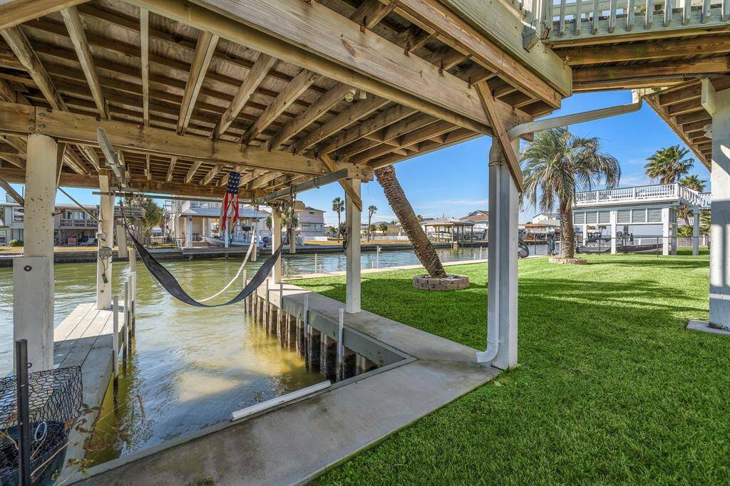 A close-up look at the boat house and covered boat lift.