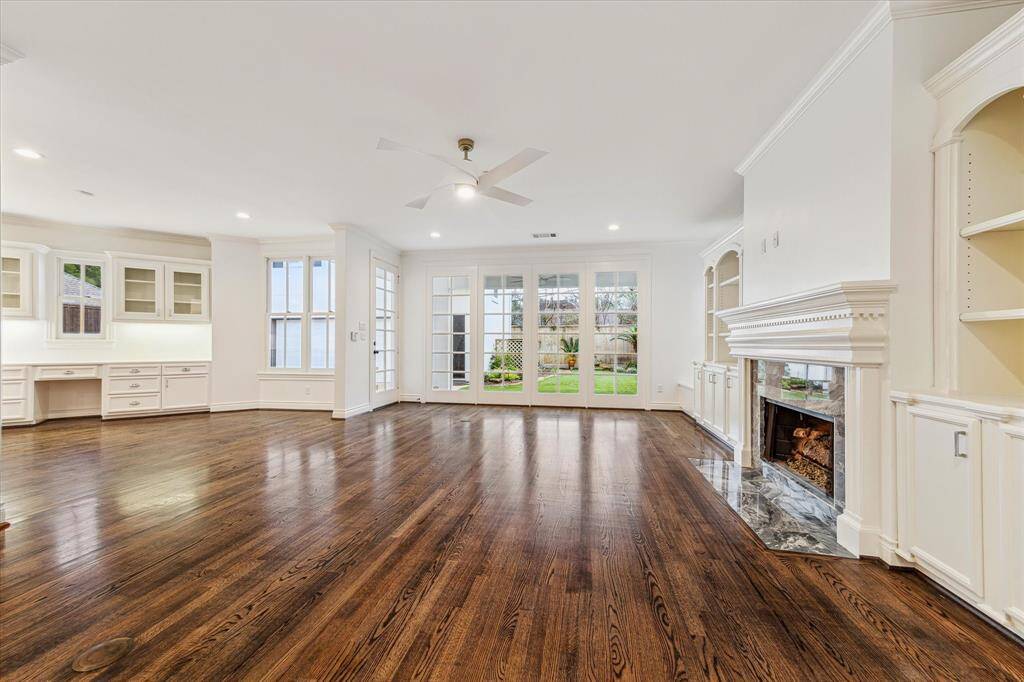 At this angle, you can see how lovely this room is. Overlooks the backyard covered patio and luscious landscaping and turfed lawn.
