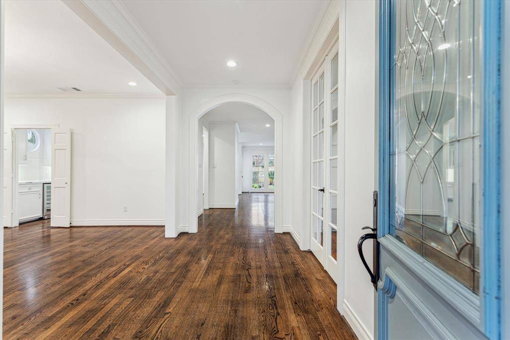 Lovely entry with formal dining room to the left and flex study/formal living to the right. Reflects the open concept throughout main floor.