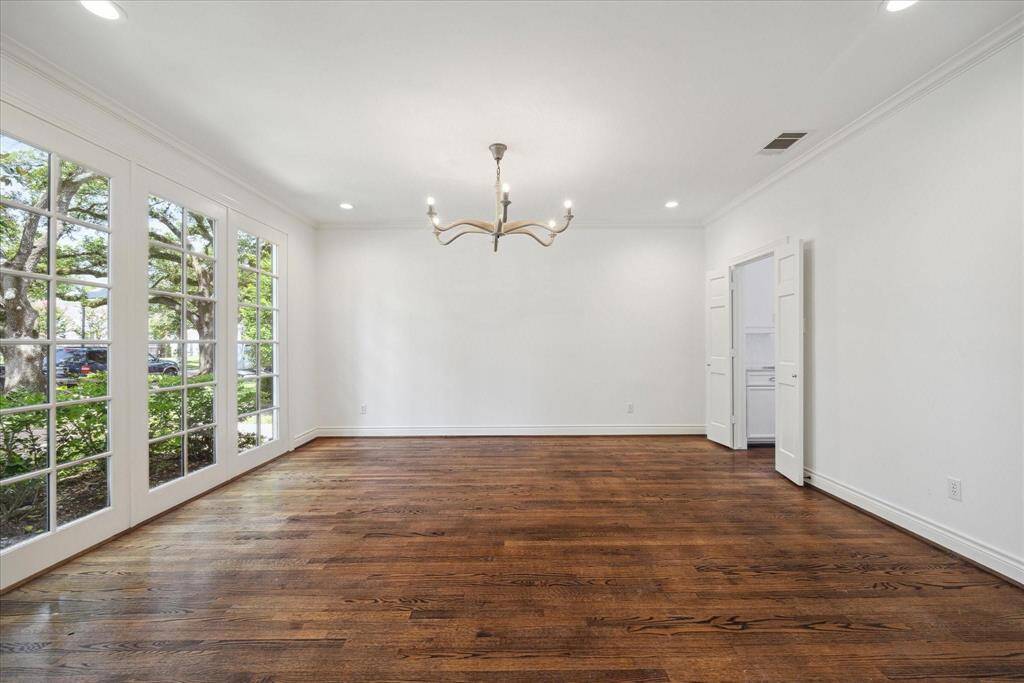 Formal Dining Room showcasing the floor to ceiling windows.
