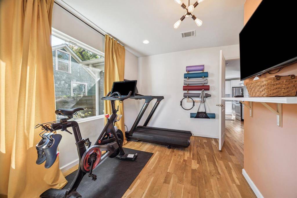 A backyard paradise! Perfect for outdoor entertaining with its large deck and patio surrounded by raised planters, mature shade trees and plenty of yard for play.
