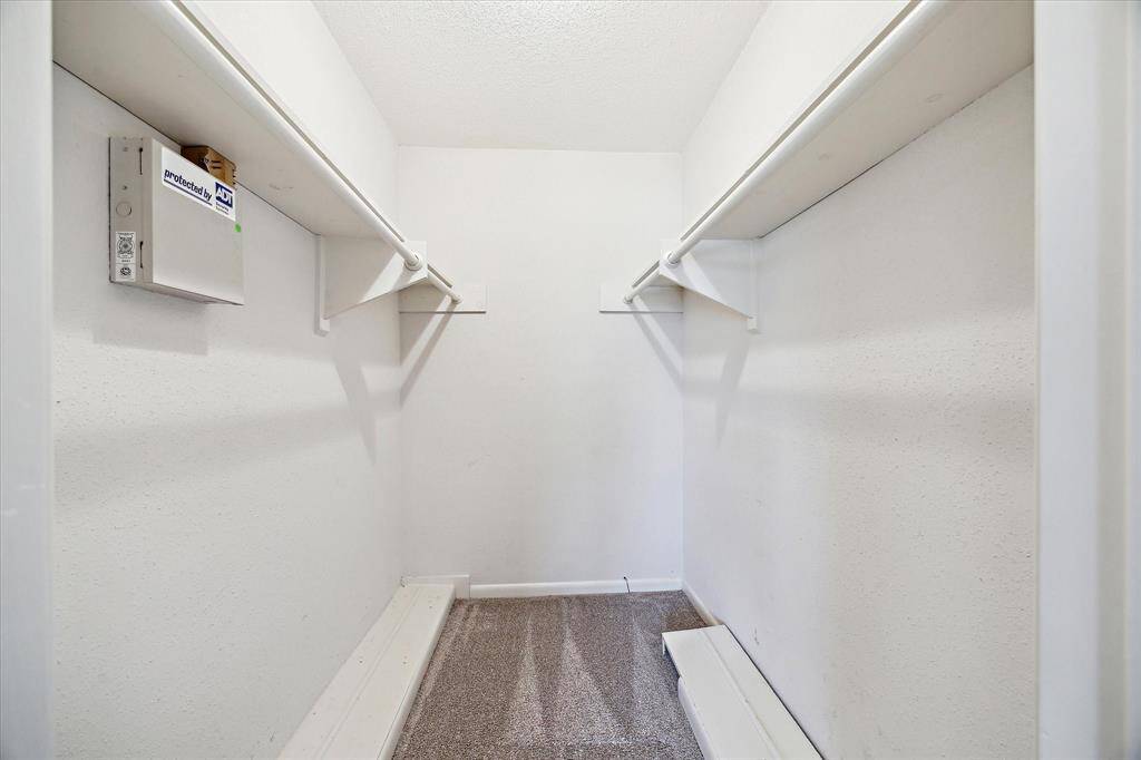 Walk-in closet in the secondary bedroom.