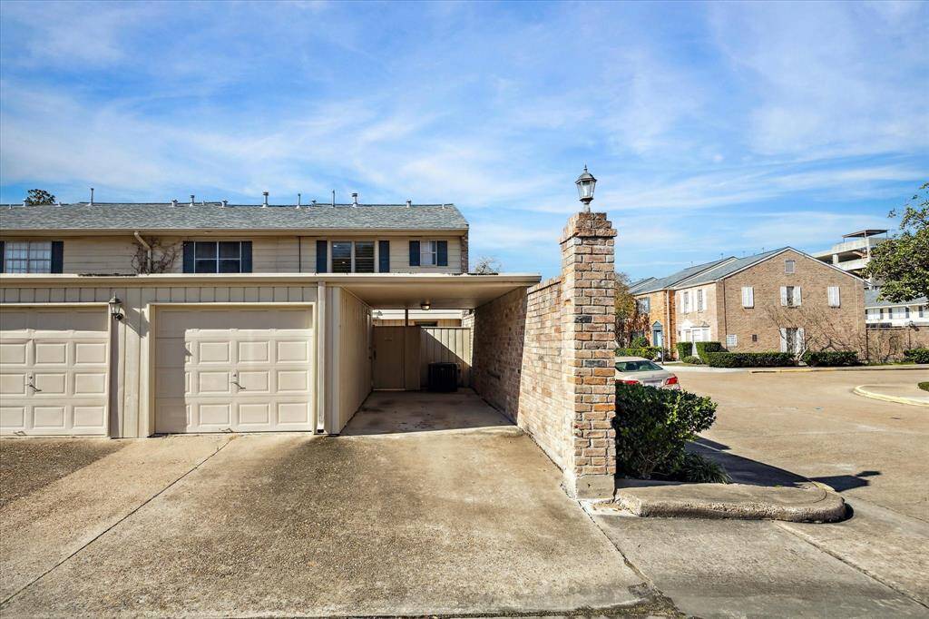 In addition to the garage, the townhome includes a carport, providing covered parking for an additional vehicle for added convenience.
