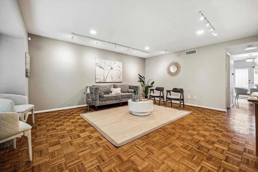 The open layout seamlessly connecting to the dining area, this space is perfect for hosting & entertaining. The expansive living room offers versatile layout possibilities, allowing for a variety of furniture arrangements to suit your style and needs.