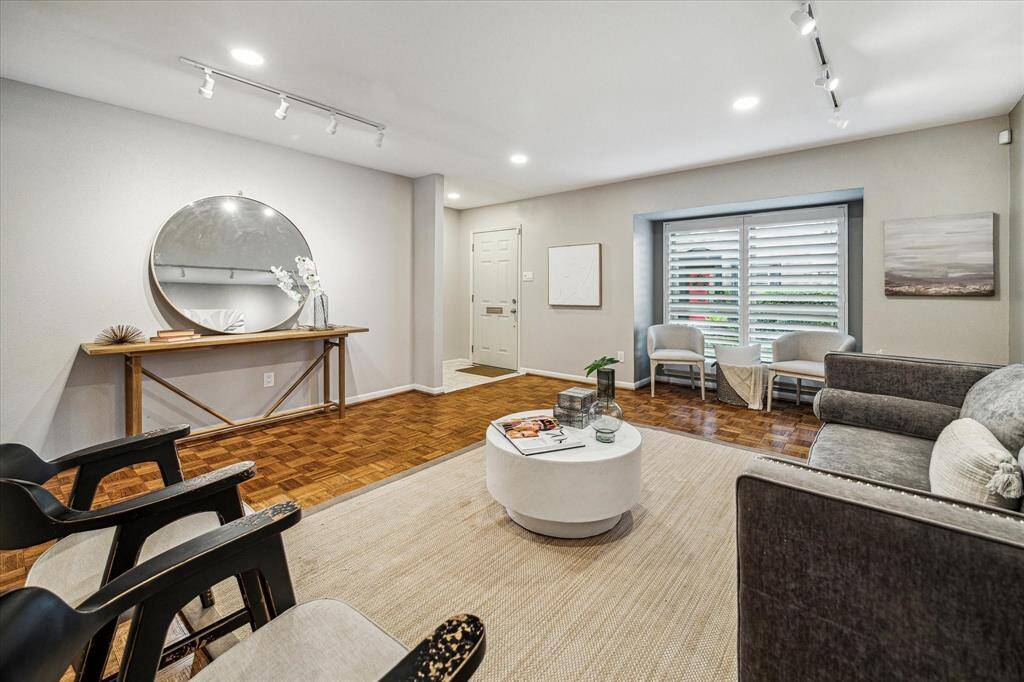 Opposite the front door is a huge storage closet with shelving for added convenience.