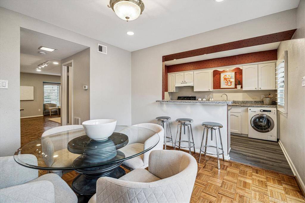 The kitchen opens to the dining room, making it effortless to entertain and stay connected with guests while preparing meals.
