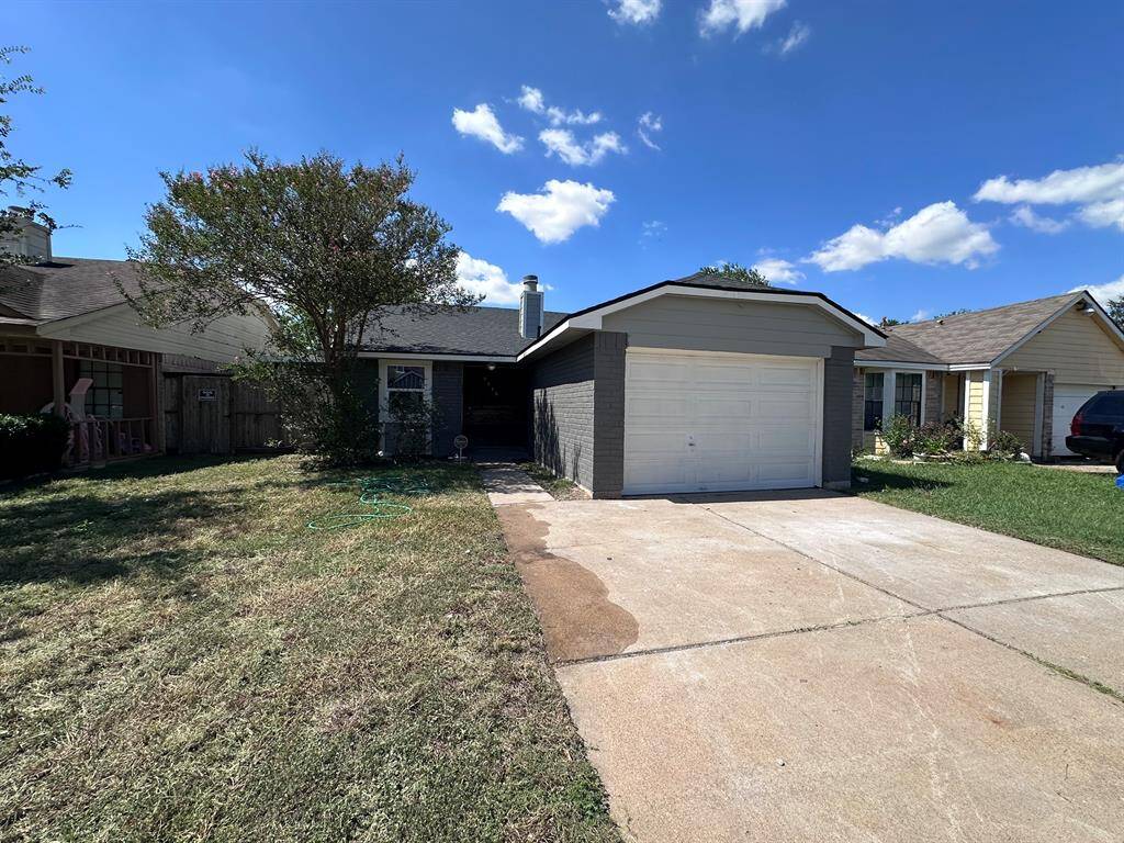 Charming single-story home with an attached garage, front yard, and mature tree. The driveway offers ample parking, and the exterior features neutral tones. Ideal for buyers seeking a cozy, well-maintained residence.
