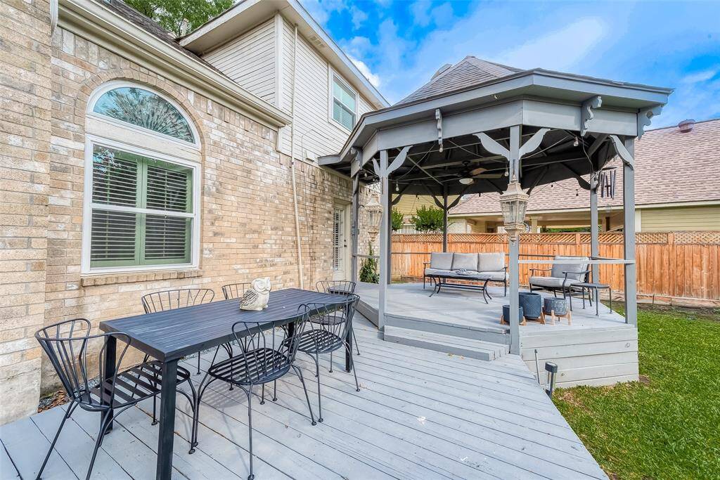 The backyard features an ELEVATED DECK WITH A GAZEBO, creating a fantastic space for outdoor entertaining and relaxation. With the added beauty of mature trees and a FULLY FENCED YARD, it provides a private and inviting haven for enjoying the outdoors. The backyard is equipped with a MOSQUITO MISTING SYSTEM, ensuring that your outdoor experiences are enjoyable and mosquito-free.