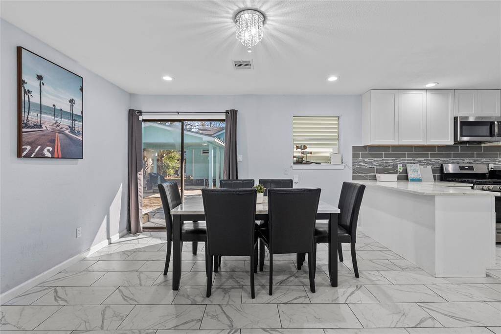Open to Kitchen and Backyard