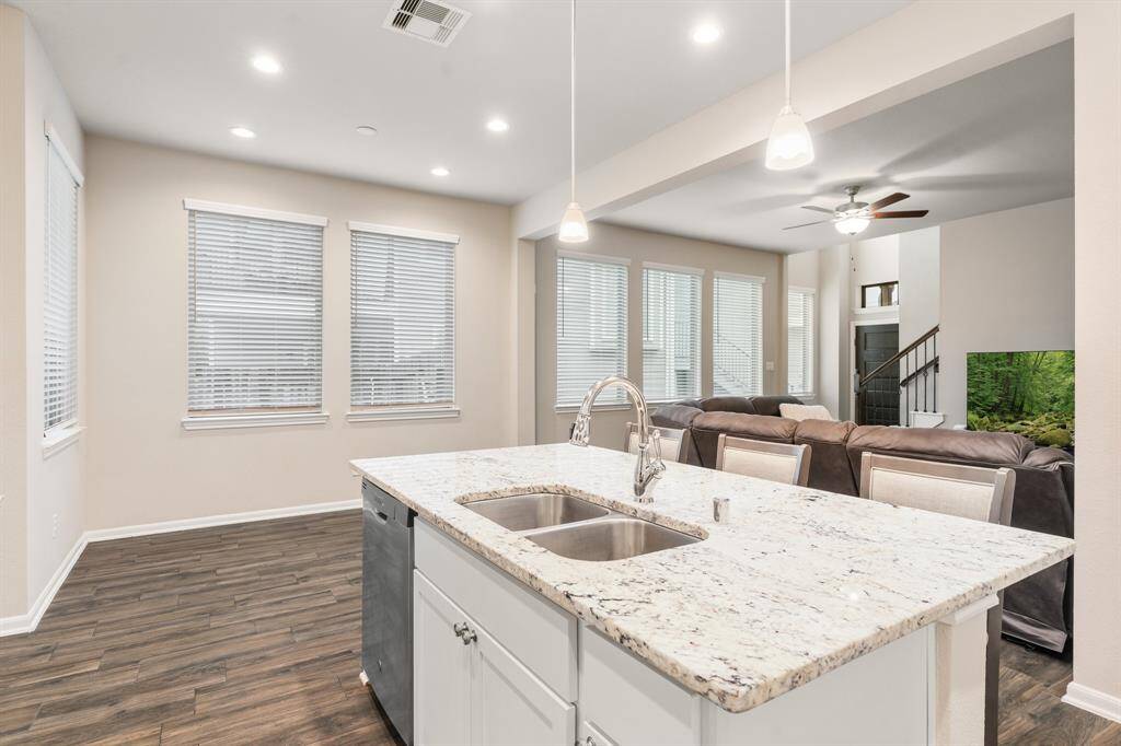 Whether you're preparing a meal or hosting a gathering, this open design ensures you're always part of the action.