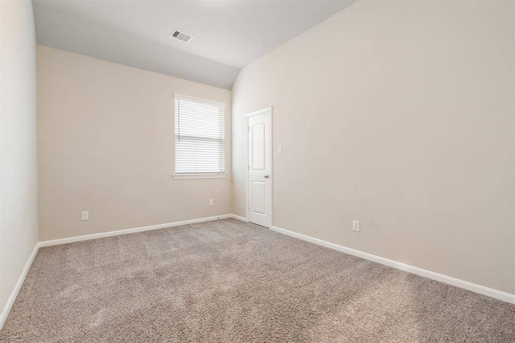 1st bedroom upstairs overlooking the side of the home.
