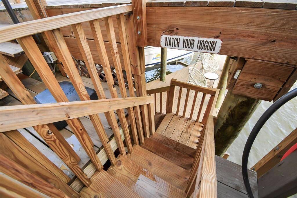 Access the boat dock by stairs from the upper deck