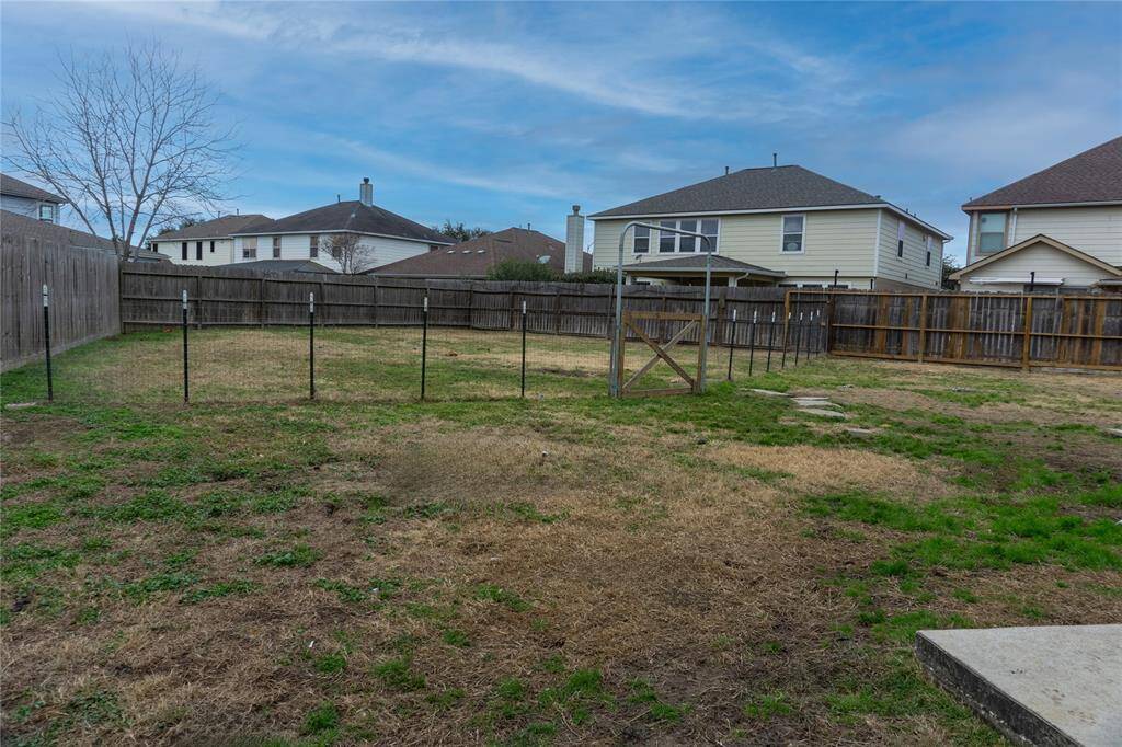 Huge back yard! Perfect for a pool or entertaining!