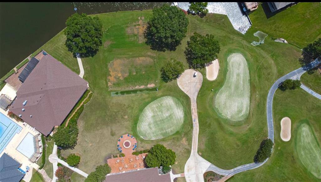 This aerial photo partially showcases the golf course, offering expansive views of the greens.