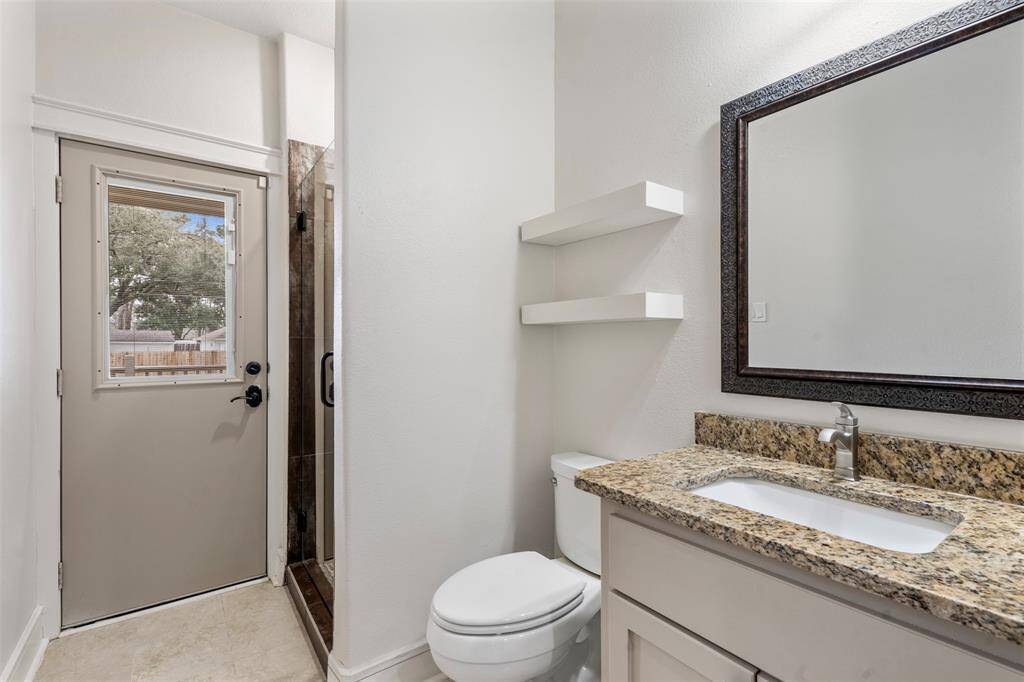 Down the hall you will find a full restroom, perfect for your pool guests.