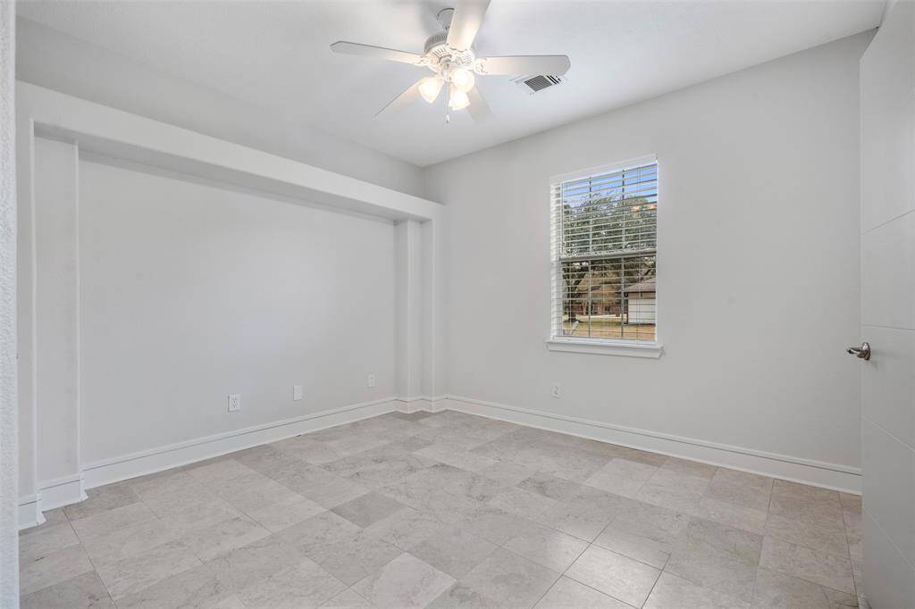 Third bedroom downstairs on opposite side of home