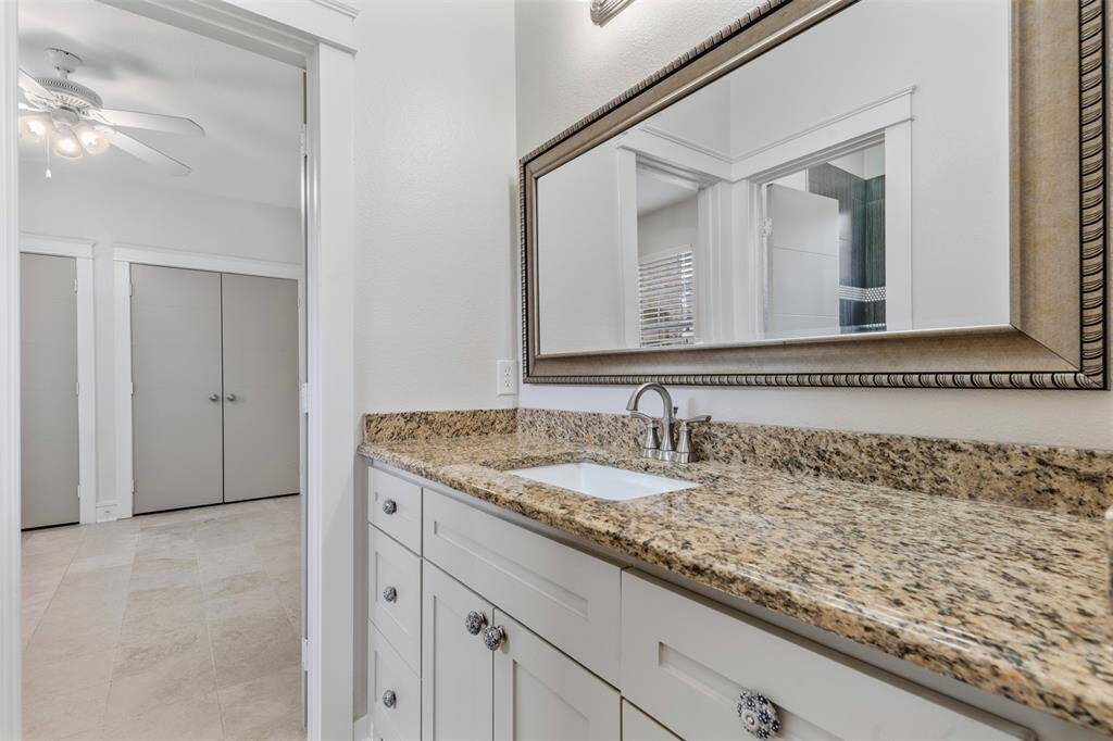 The restroom adjoining the two secondary bedrooms.