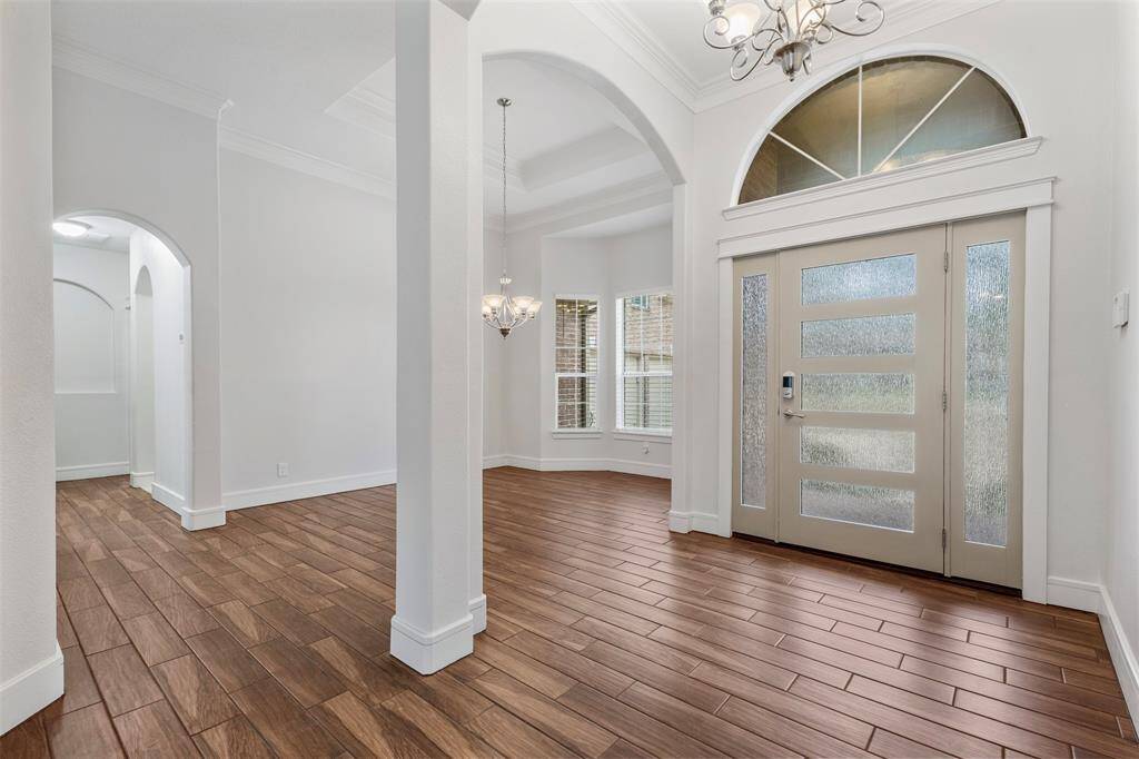 Upon entry, you'll notice the natural lighting and windows abound in this home.