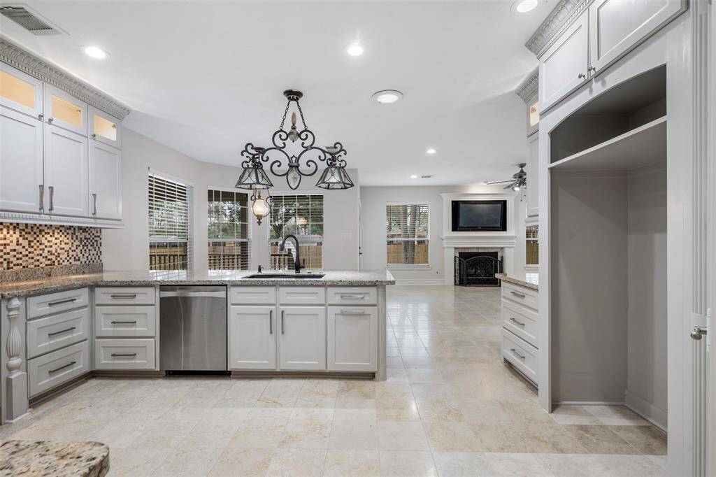 Let's view the stunning kitchen with marble floors,