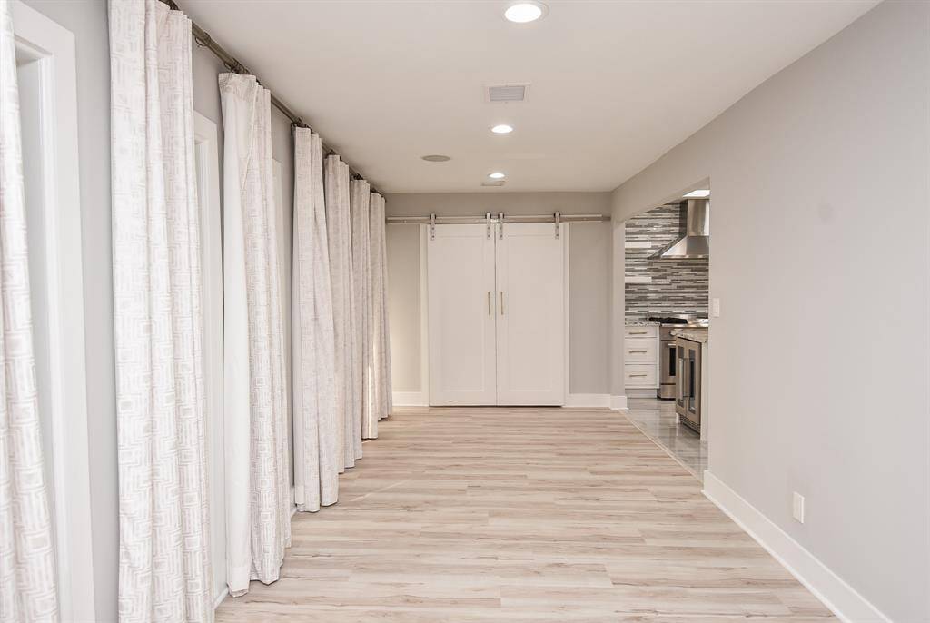 Dine in style with seamless access to the modern kitchen.